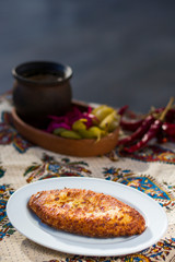 Georgian traditional food Chvishtari, corn meal with cheese and corn. Baked and ready to eat.
