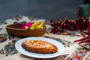 Georgian traditional food Chvishtari, corn meal with cheese and corn. Baked and ready to eat.