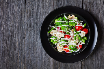 salad of broccoli florets, green beans, tomatoes