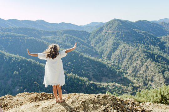 young woman in the mountains
