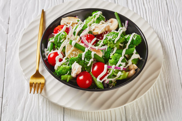 salad of broccoli florets, green beans, tomatoes