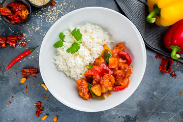 chicken in sweet and sour sauce with rice, chinese cuisine - 371189357