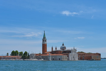 Fototapeta na wymiar San Giorgio Maggiore, Venice. Church on the island of the same name in Venice. Blue lagoon view