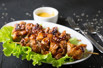 Chicken skewers with teriyaki sauce