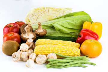 Close-up variety of fresh vegetables on white background