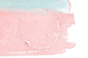 Fototapeta premium Shiny golden round frame on blue and pink watercolor stains on white background