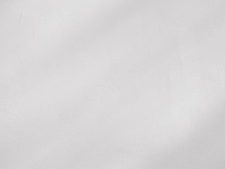 white cement plaster wall with shadow