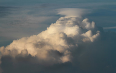 Cumulonimbus and anvil-shaped apex. Contrasts of light and shadow.