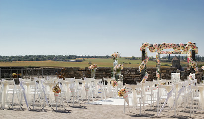 Wedding decoration of mirrors and flowers for the wedding ceremony