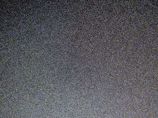 Dark grey fine grained background