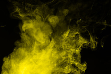 Yellow steam on a black background.