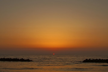 Fototapeta premium Beautiful orange sunset on the beach, Japan