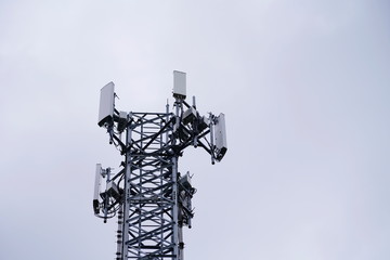 Telecommunication pole of 4G and 5G cellular. Base Station or Base Transceiver Station. 5G radio network telecommunication equipment with radio modules and smart antennas mounted on a metal.  