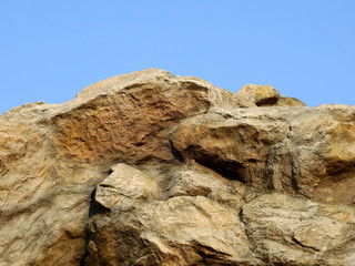 stone of mountain with blue sky background