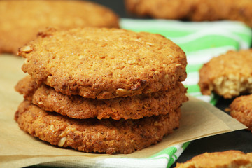 Homemade oatmeal cookie at dark background