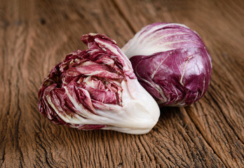 Obraz premium uncooked fresh radiccio on wooden background