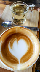 The cup of coffee has been drank. But still has the pattern of the latte art