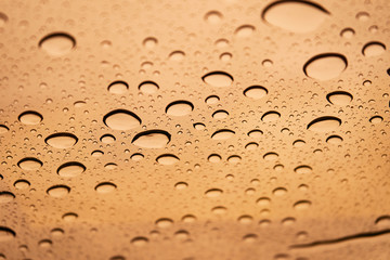 Raindrops background on glass close-up