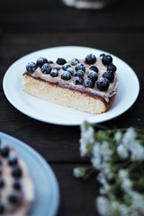 
pie with black currant berries on a wooden table