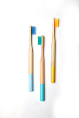 bright toothbrushes on a white background