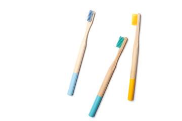 bright toothbrushes on a white background