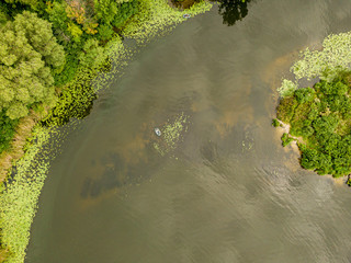 Aerial drone view. Fishing boat on the river on a summer day.