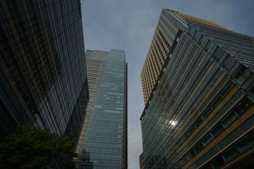 Obraz premium High-rise buildings and blue sky - Tokyo, Japan