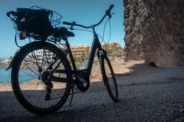 Silhouette a bicycle with a sea view in Valle Gran Ray, La Gomera, Canary islands, Spain