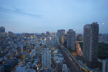 Naklejka na ściany i meble Beautiful urban cityscape of Tokyo under twilight sky