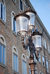 
Venetian building facade with lamppost in the foreground