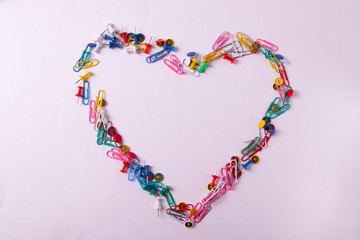 different stationary supplies items on white office or studying desk