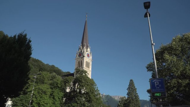 Tower of the St Florin Cathedral in Vaduz, the capital of the Principality of Liechtenstein in the European Alps