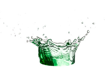 Green water or juice scattered on a white background. Freshness concept.