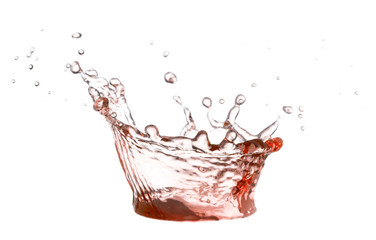 Red water or juice spread on a white background. Freshness concept.