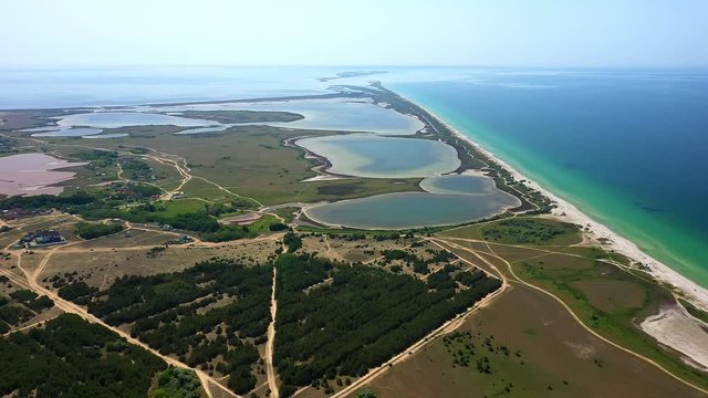 Flight over the Kinburn spit, sea white sand, Copter video