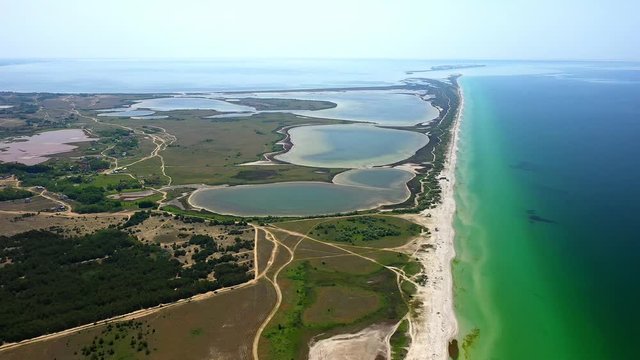 Flight over the Kinburn spit, sea white sand, Copter video
