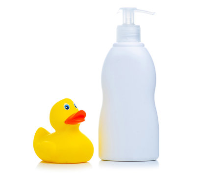 Yellow Rubber Duck And Baby Shampoo Soap On White Background Isolation