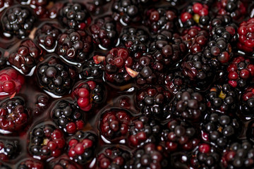 summer juicy blackberries or blueberries close up for cooking delicious and healthy food