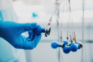 Close up of ECG electrodes taking by doctor's hand