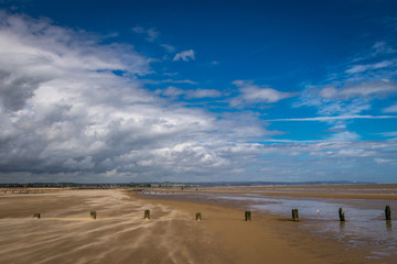 Sandstorm on a deserted beach at Dymchurch, Kent, England