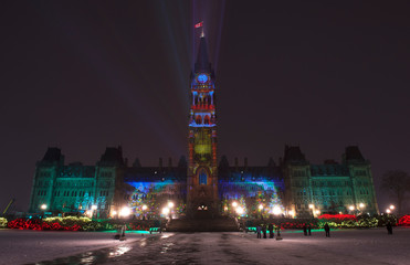 Fototapeta na wymiar Christmas Lightshow on Parliament Building Canada