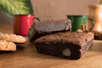 snack with cookies and brownies and cups of coffee