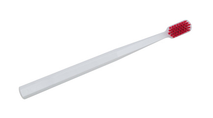 White toothbrush with red hairs isolated on a white background