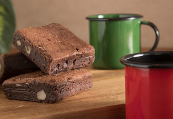 snack with cookies and brownies and cups of coffee