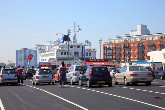 Portsmouth, United Kingdom, Apr 22, 2011 : Portsmouth International Port with a car ferry boat having docked with its passengers in their cars queuing to board