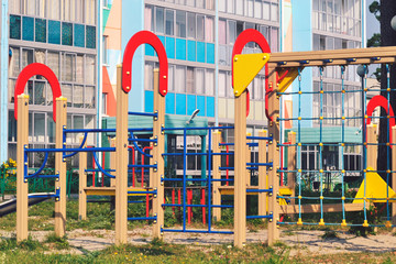 Fototapeta na wymiar Children's colored slides playground on a street.