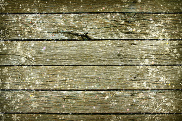 Old wooden wall texture.Various old textured wooden boards with white snowflakes. New year background, copy of the space.