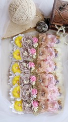 Headband flower made out of flower fabric in beautiful pastel colors. The handmade floral is great for hair accessories with its colorful flower and beautiful for hair band.