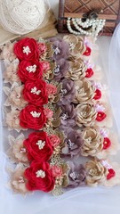 Headband flower with pastel color made out of flower fabric in beautiful red and brown shades. The handmade floral is great for hair accessories with its colorful flower and beautiful for hair band.