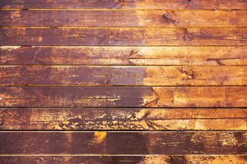 Footprints of shoes on painted wooden boards. Selective focus.